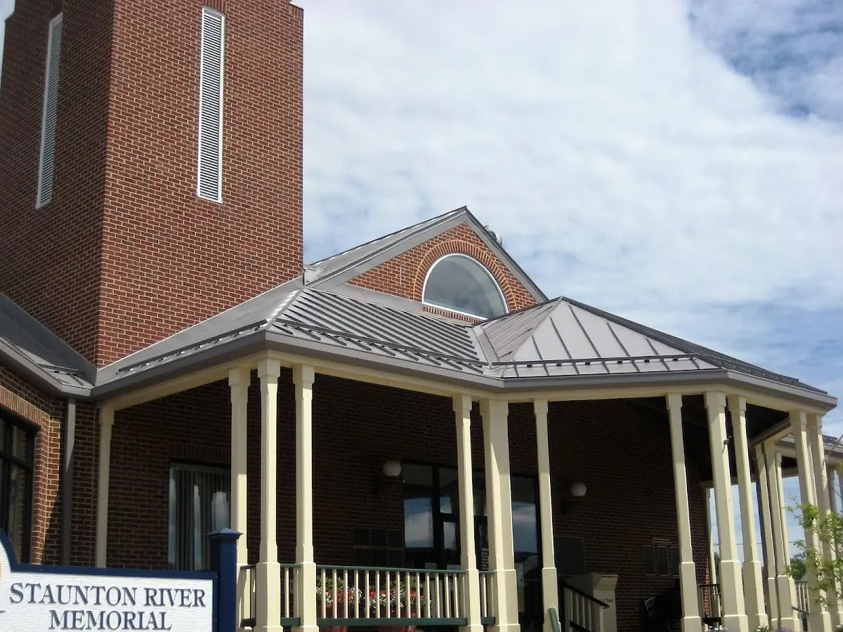 Skilled roofing craftsmen working on a residential roof in Fall City